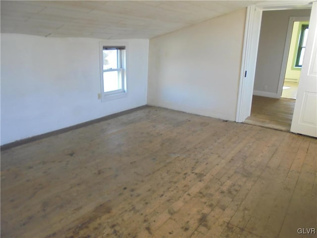 spare room featuring hardwood / wood-style flooring