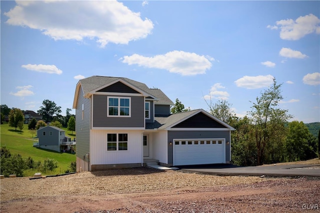 view of front of property featuring a garage