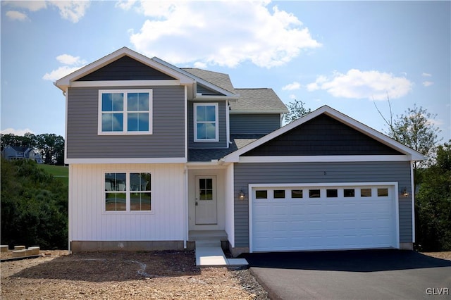 view of front of property with a garage