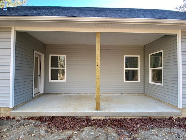 doorway to property with a patio