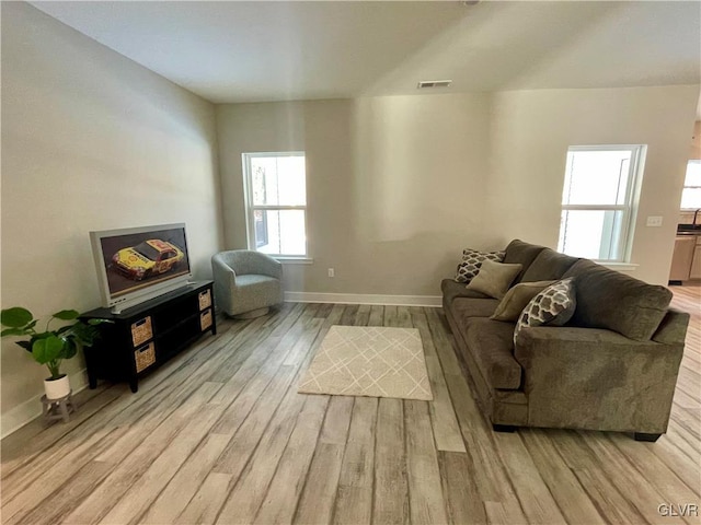 living room with light wood-type flooring