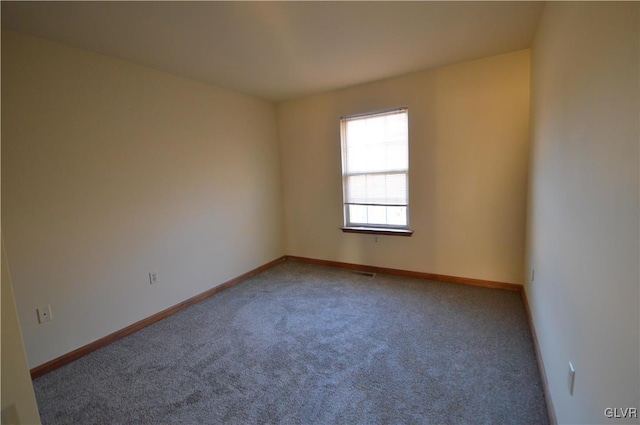 view of carpeted spare room