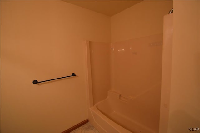 bathroom with tile patterned floors