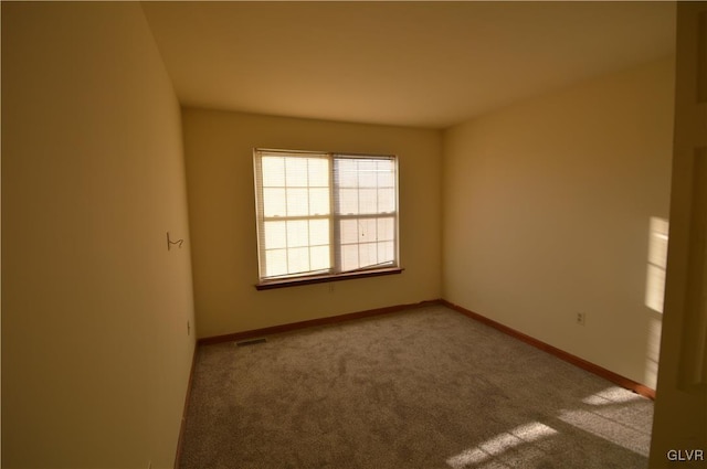 view of carpeted spare room