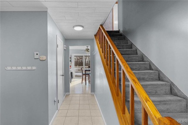 stairs with tile patterned floors