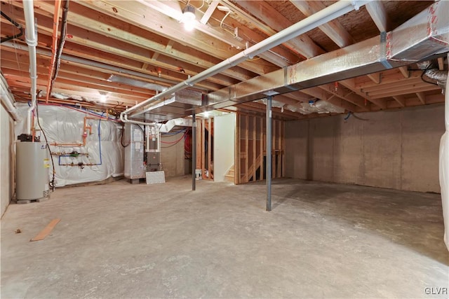 basement with heating unit and water heater