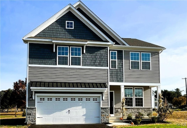 craftsman inspired home featuring a garage