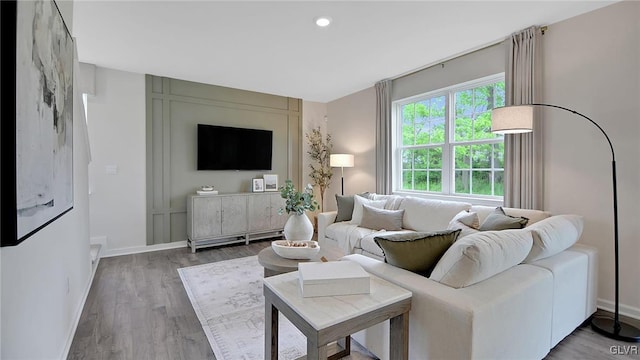 living room with wood-type flooring