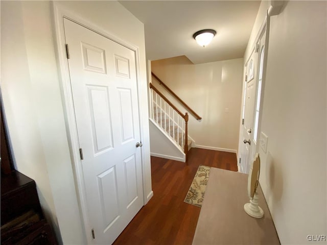 interior space featuring stairway and dark wood-style floors