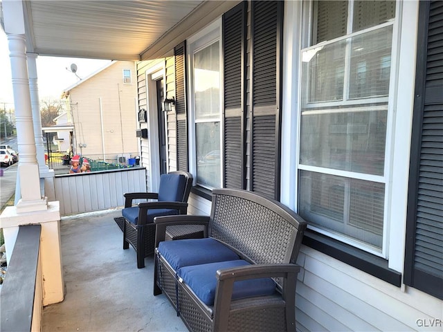 view of patio featuring covered porch