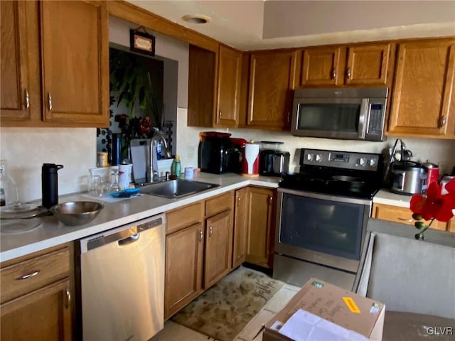 kitchen featuring appliances with stainless steel finishes and sink