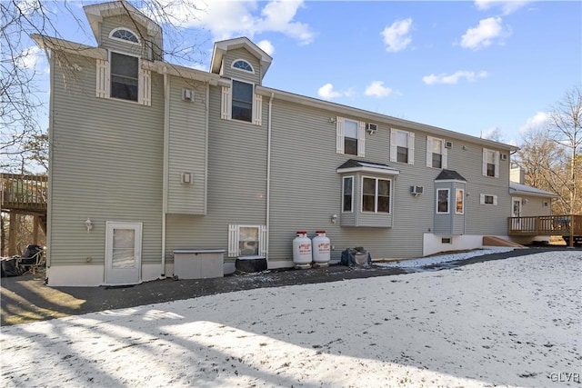 rear view of house with a deck