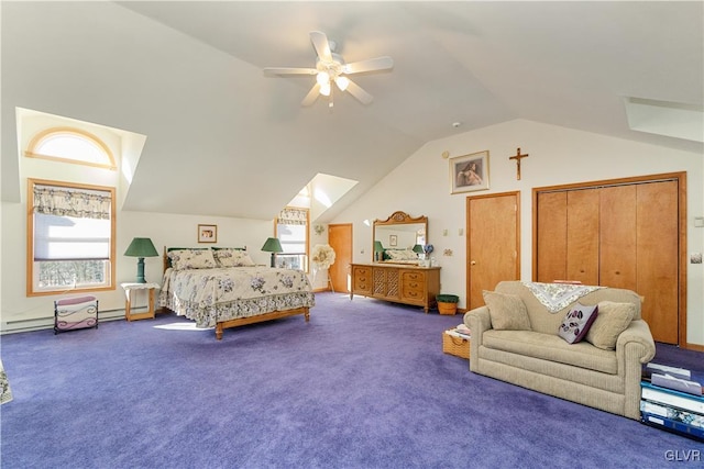 bedroom featuring carpet flooring, ceiling fan, two closets, and vaulted ceiling