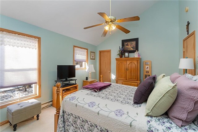 bedroom with light carpet, vaulted ceiling, baseboards, and a ceiling fan