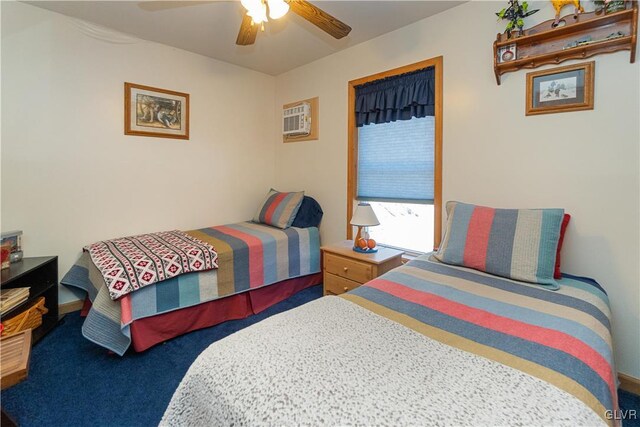 carpeted bedroom with a wall mounted air conditioner and ceiling fan