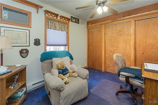 home office featuring a baseboard radiator, carpet floors, and a ceiling fan