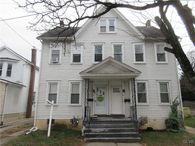 view of front of home featuring cooling unit