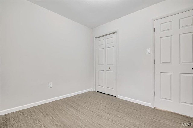 empty room featuring light hardwood / wood-style flooring