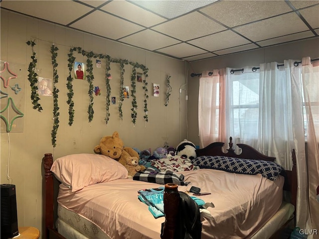 bedroom featuring a paneled ceiling