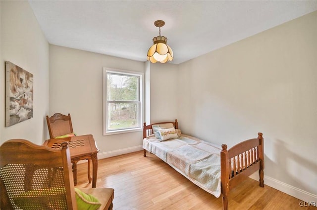 bedroom with light wood-type flooring