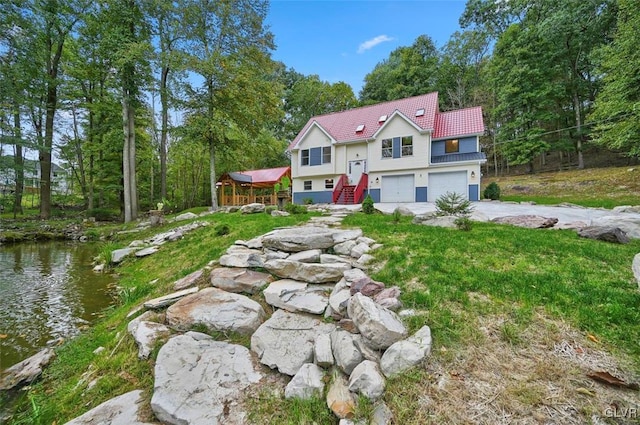 view of front of property with a garage