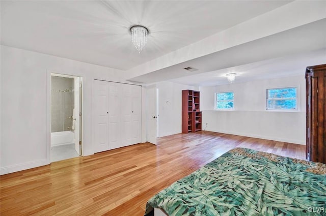 interior space with a chandelier and wood-type flooring