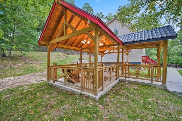 view of property's community featuring a yard