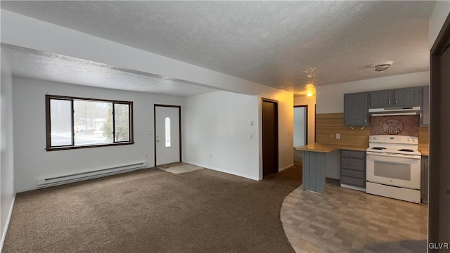 kitchen with carpet, decorative backsplash, gray cabinetry, baseboard heating, and white range with electric cooktop