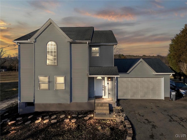 view of front of property featuring a garage