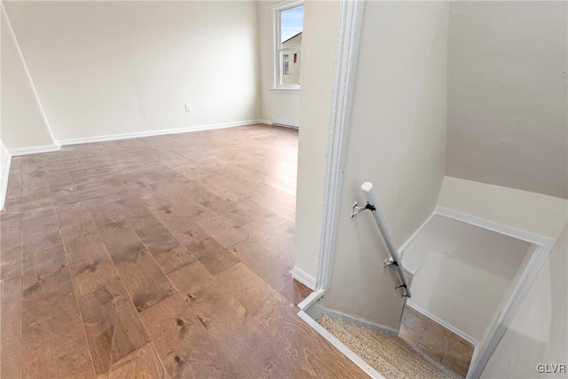 bathroom with hardwood / wood-style flooring