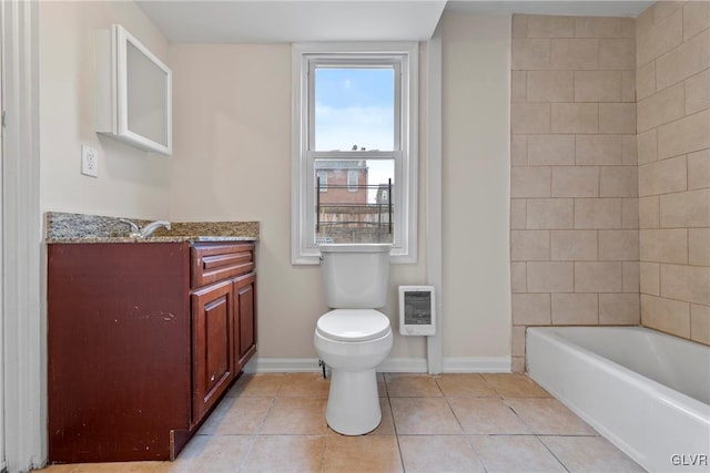 bathroom featuring tile patterned flooring, vanity, heating unit, and toilet