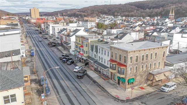 drone / aerial view featuring a mountain view