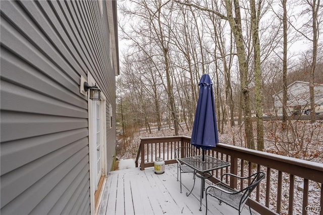 view of snow covered deck