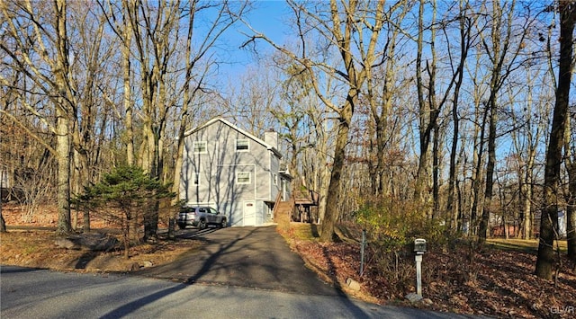 exterior space with a garage