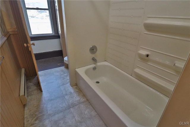 bathroom with shower / tub combination and toilet