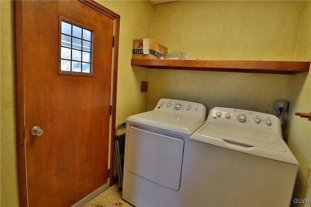 laundry room with washer and clothes dryer