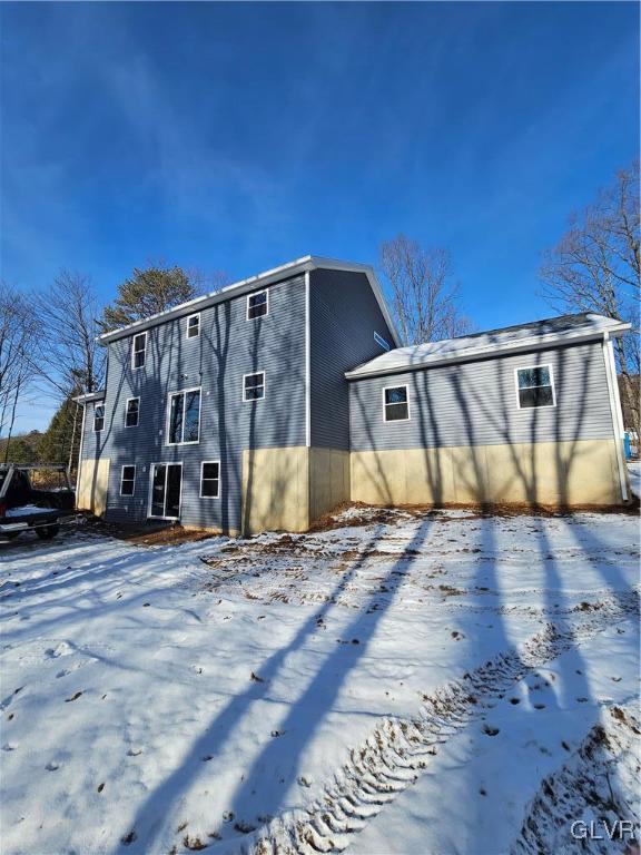 view of snow covered property