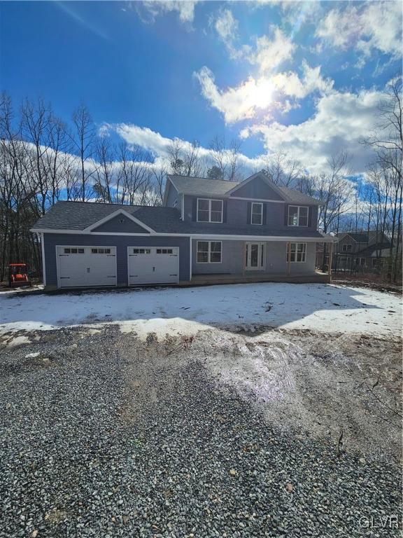 view of front of home featuring a garage