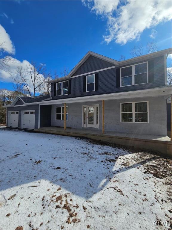 view of property featuring a garage