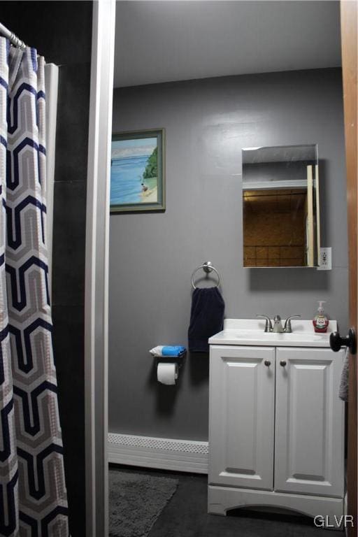 bathroom with vanity and curtained shower