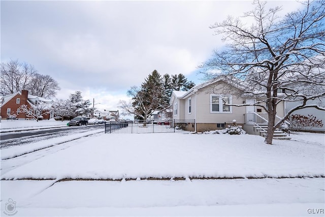 view of yard covered in snow