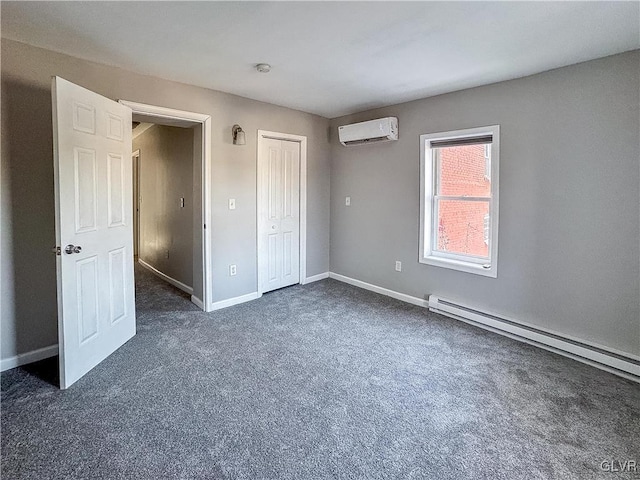 unfurnished bedroom featuring a wall mounted air conditioner, a baseboard radiator, dark carpet, and a closet