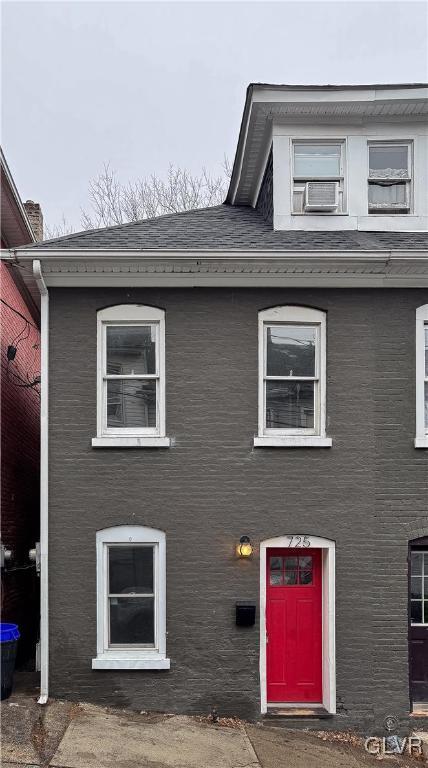 view of front of house with cooling unit