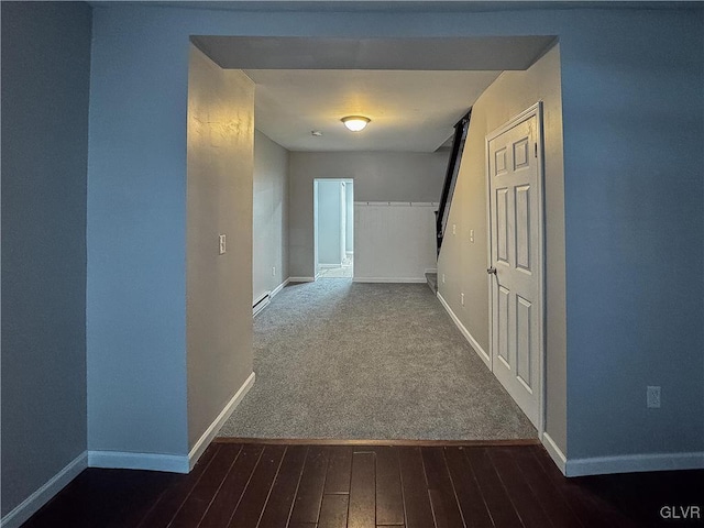 corridor with dark carpet