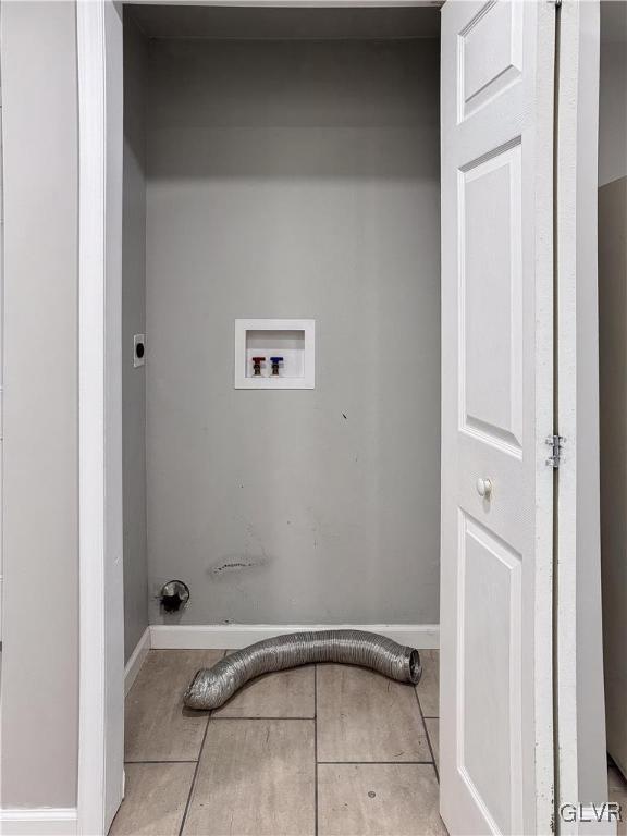 clothes washing area featuring washer hookup and electric dryer hookup