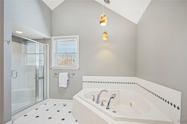 bathroom featuring tile patterned floors, lofted ceiling, and shower with separate bathtub