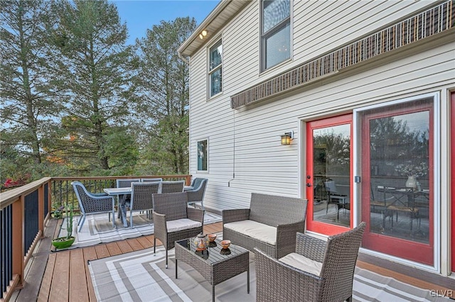 wooden deck with outdoor lounge area