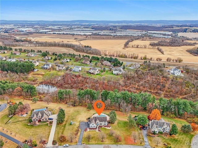 birds eye view of property featuring a rural view