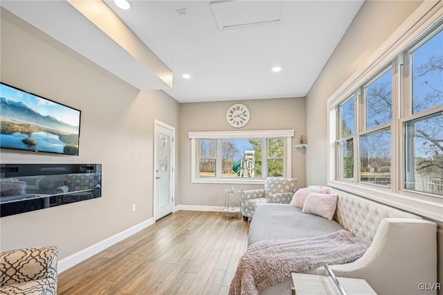 sitting room with light hardwood / wood-style floors