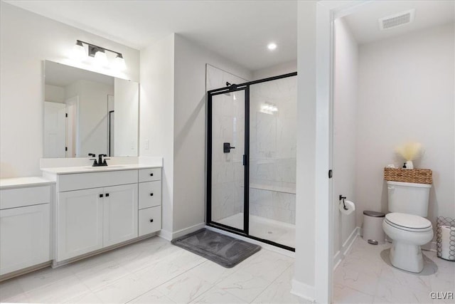 bathroom with walk in shower, vanity, and toilet